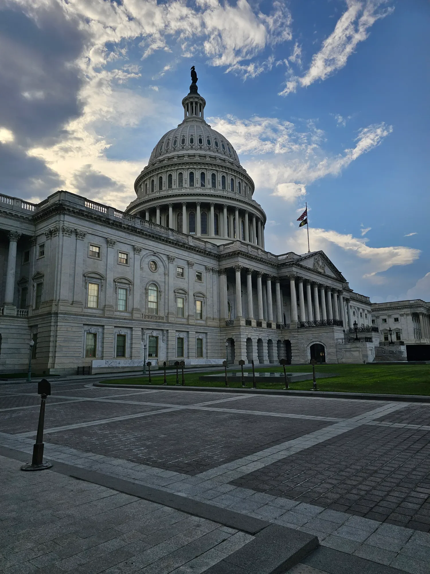 United States Capitol photographed beneath a darkening sky